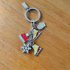 Coach Festive Keychain with Red and Cream Charms